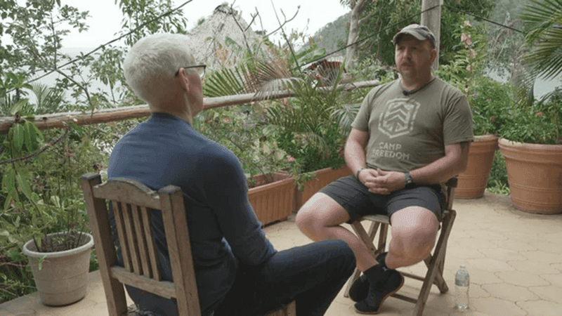 Anderson Cooper speaking with a veteran about psilocybin therapy for PTSD