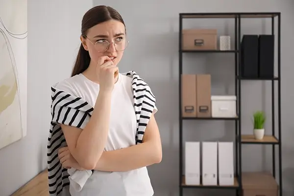 A woman with OCD appears distressed