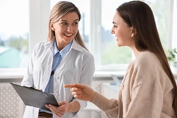 A doctor talking to a patient about OCD