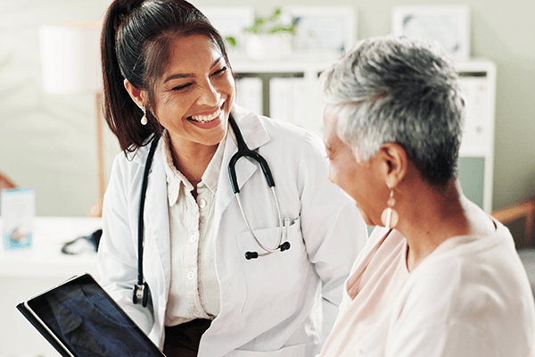 Patient discussing chronic pain treatment options with a physician