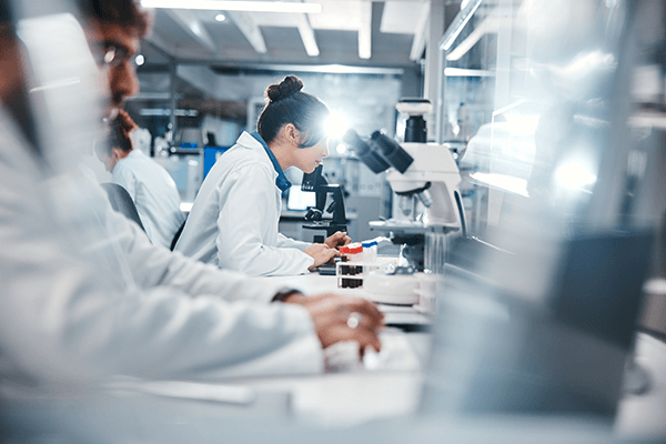 A team of scientists working in a lab.